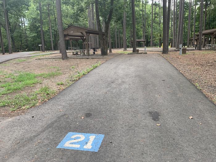 A photo of Site 21 of Loop CARTER COVE  at CARTER COVE with Picnic Table, Electricity Hookup, Fire Pit, Shade, Lantern Pole