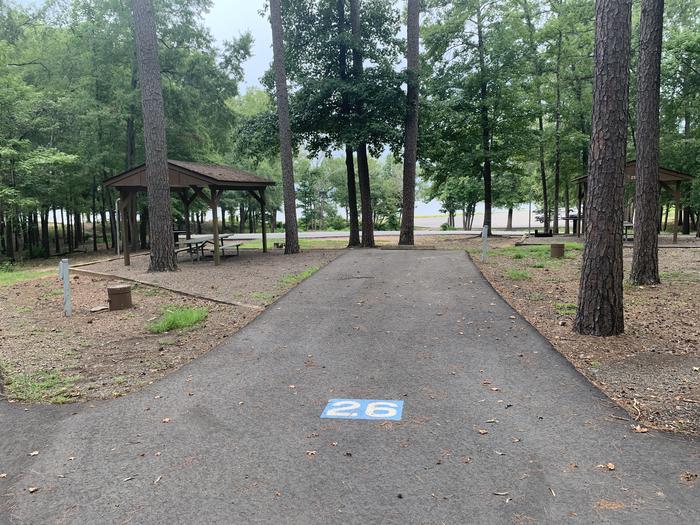 A photo of Site 26 of Loop CARTER COVE  at CARTER COVE with Picnic Table, Electricity Hookup, Fire Pit, Shade, Lantern Pole, Water Hookup