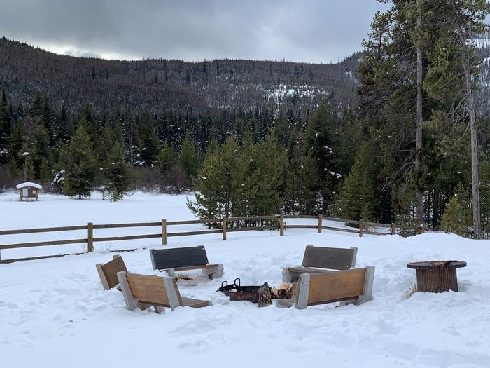 Benches around a campfire in the wintertime.Open year round! Come play in the winter, cross country ski from the back yard.