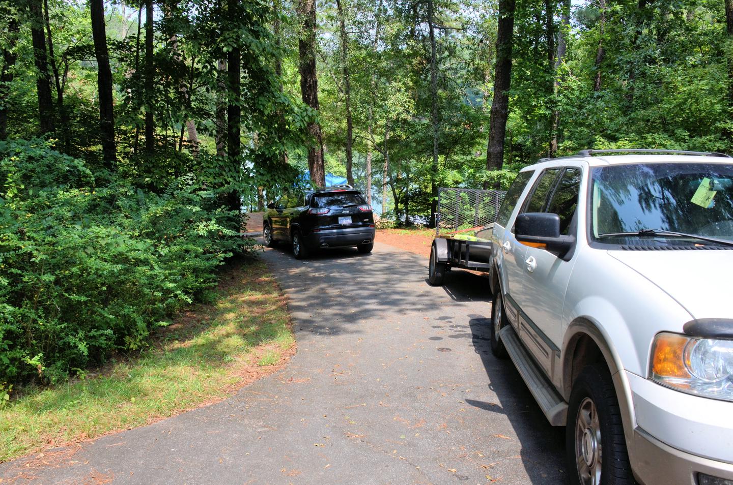 Driveway view.McKaskey Creek Campground, campsite 3.  Driveway is sloped, slanted and small.