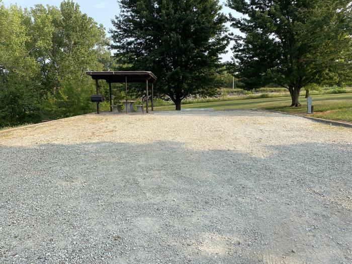 A photo of Site 001 of Loop SFET at SANTA FE TRAIL with Picnic Table, Fire Pit, Shade, Full Hookup