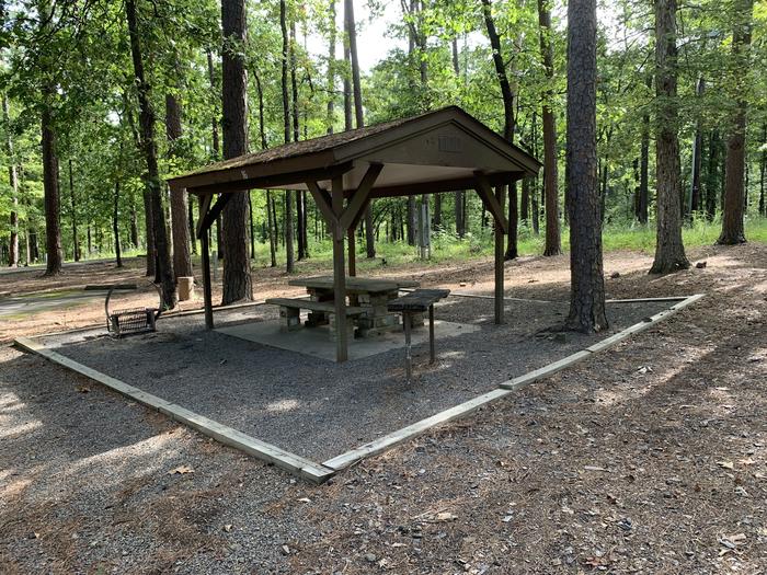 A photo of Site 16 of Loop QCOV at QUARRY COVE with Picnic Table, Shade, Water Hookup