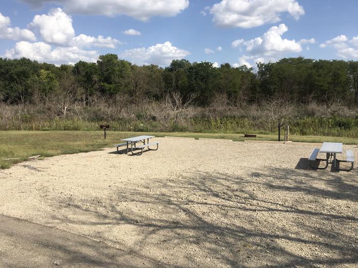 A photo of Site A023 (Buddy Site) of Loop A at CURTIS CREEK with Picnic Table, Electricity Hookup, Fire Pit, Waterfront, Water Hookup