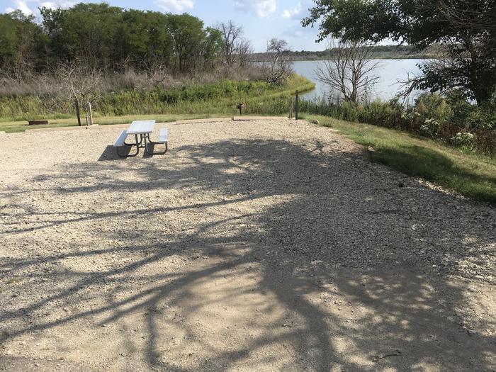 A photo of Site A022 (Buddy Site) of Loop A at CURTIS CREEK with Picnic Table, Electricity Hookup, Fire Pit, Waterfront, Water Hookup