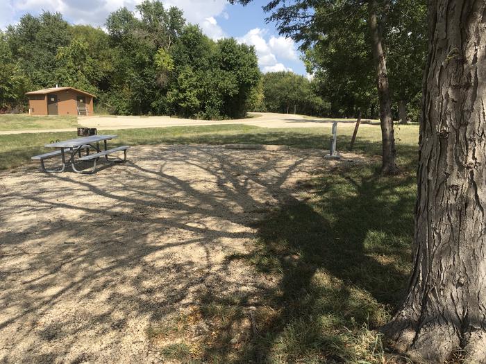 A photo of Site A001 of Loop A at CURTIS CREEK with Boat Ramp, Picnic Table, Fire Pit, Shade, Water Hookup