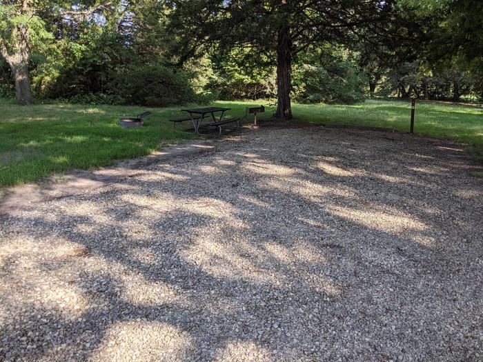 A photo of Site 14 of Loop A at Timber Creek Park with Picnic Table, Fire Pit, Shade
