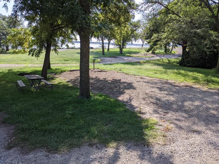 A photo of Site 2 of Loop A at Timber Creek Park with Picnic Table, Fire Pit, Shade