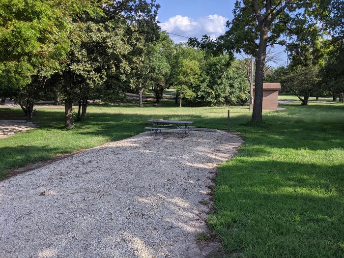 A photo of Site 8 of Loop A at Timber Creek Park with Picnic Table, Fire Pit, Shade