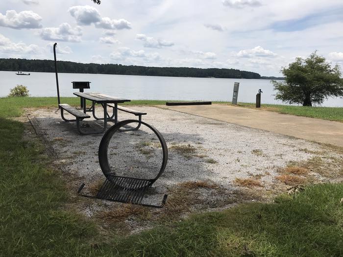 A photo of Site 098 of Loop LOOF at R SHAEFER HEARD with Picnic Table, Electricity Hookup, Fire Pit, Tent Pad, Waterfront, Lantern Pole, Water Hookup