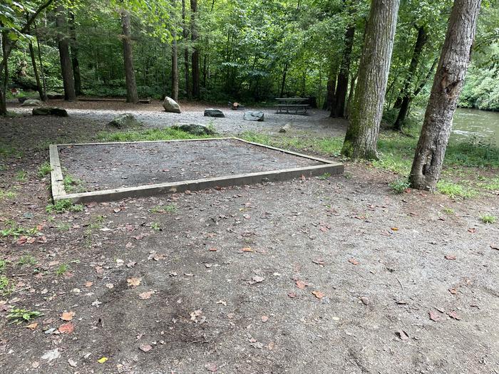 A photo of Site A08 of Loop A at ABRAM'S CREEK CAMPGROUND with Shade, Tent Pad, Waterfront