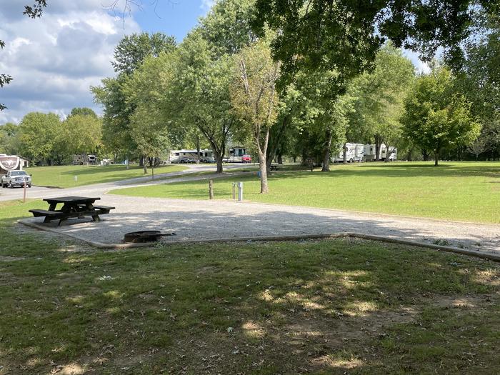 A photo of Site 154 of Loop HONE at DEFEATED CREEK PARK with Picnic Table, Electricity Hookup, Sewer Hookup, Fire Pit, Shade, Full Hookup, Water Hookup
