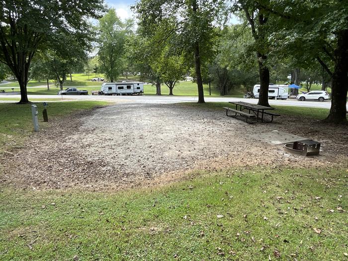 A photo of Site 029 of Loop HILL at DEFEATED CREEK PARK with Picnic Table, Electricity Hookup, Fire Pit, Shade, Water Hookup
