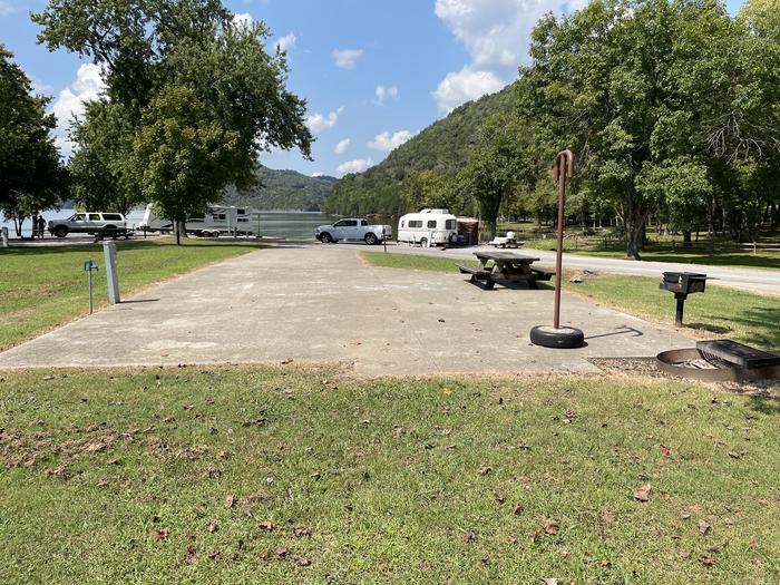 A photo of Site 009 of Loop LAKE at DEFEATED CREEK PARK with Picnic Table, Electricity Hookup, Fire Pit, Lantern Pole, Water Hookup