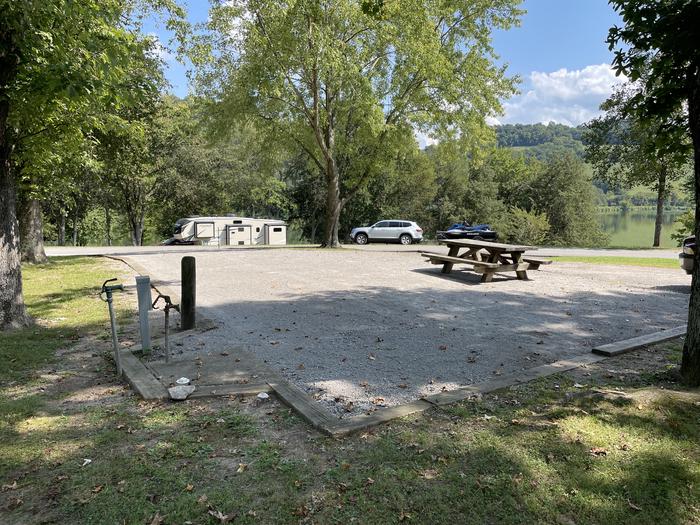 A photo of Site 088 of Loop LAKE at DEFEATED CREEK PARK with Picnic Table, Electricity Hookup, Sewer Hookup, Fire Pit, Shade, Full Hookup, Water Hookup