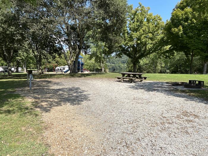 A photo of Site 072 of Loop LAKE at DEFEATED CREEK PARK with Picnic Table, Electricity Hookup, Fire Pit, Shade, Water Hookup