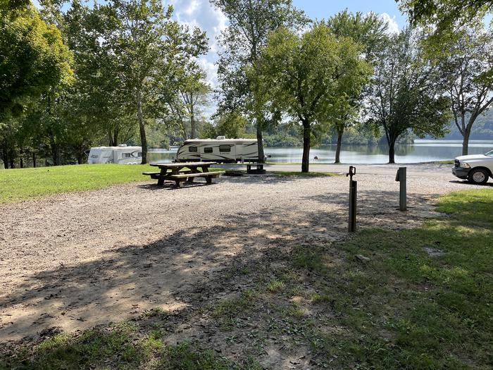 A photo of Site 072 of Loop LAKE at DEFEATED CREEK PARK with Picnic Table, Electricity Hookup, Fire Pit, Shade, Water Hookup