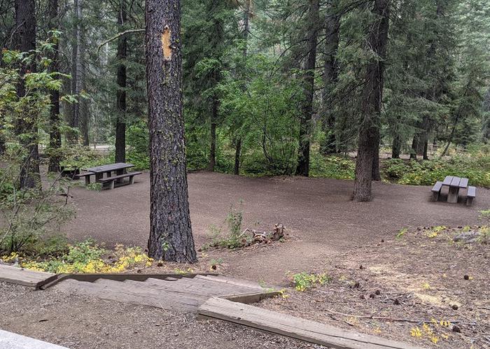 Picnic tables for sites 3 and 5 are adjacent and accessed by short stairway from each site.