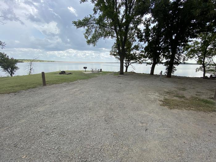 A photo of Site 015 of Loop WHITEHALL BAY  at WHITEHALL BAY with Picnic Table, Full Hookup, Waterfront