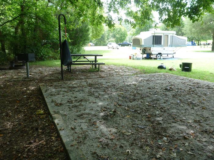 Tyler Bend Main Loop Site# 6 Site #6, 45' back-in, tent pad 15' x 15'.  Parking area is wide enough to park RV & car side by side.