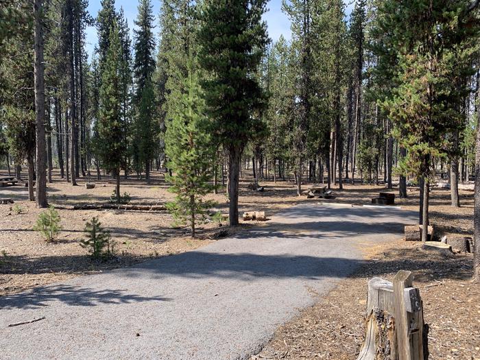 A photo of Site E05 of Loop Loop E at BROKEN ARROW CAMPGROUND with Picnic Table, Fire Pit, Shade, Tent Pad