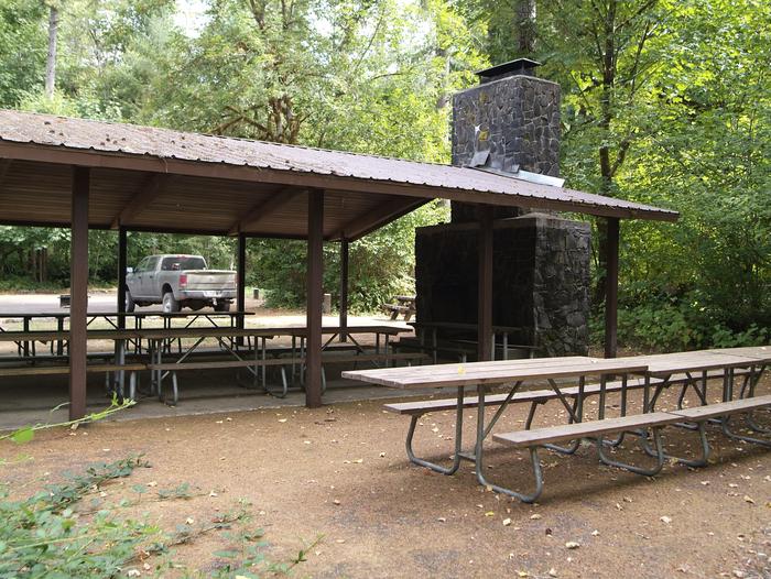 Shelter 2: Day Use only. Includes stand up grills, tables, and fire place. 