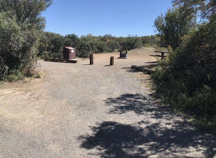 View of exit to pull-through within Campsite A-011