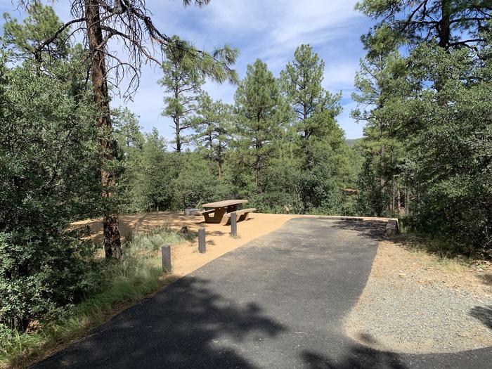 A photo of Site 27 of Loop F at LYNX CAMPGROUND with Picnic Table, Fire Pit