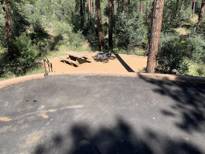 A photo of Site 14 of Loop C at LYNX CAMPGROUND with Picnic Table, Fire Pit with curbside parking and 8 steps down to campsite. 
