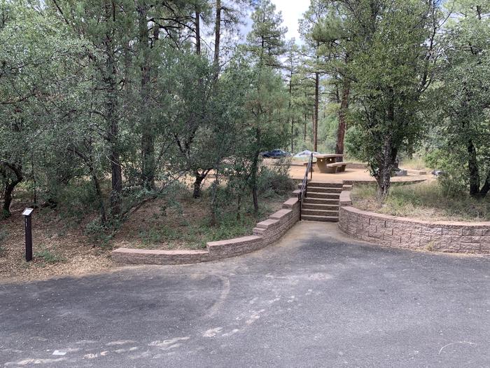 A photo of Site 11 of Loop C at LYNX CAMPGROUND with Picnic Table, Fire Pit with curbside parking and 7 steps to campsite. 