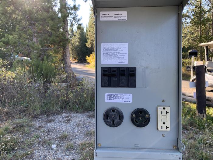 A photo of Site 12 of Loop 1 at Signal Mountain Lodge Campground with Electricity Hookup