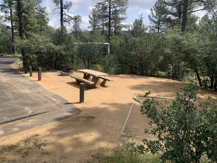 A photo of Site 02 of Loop A at LYNX CAMPGROUND with Picnic Table, Fire Pit