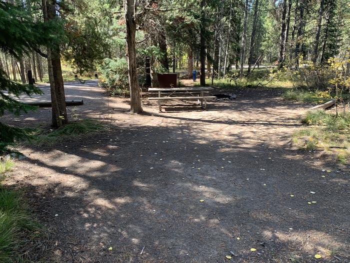 A photo of Site 23 of Loop Loop 2 at Lizard Creek Campground with Picnic Table, Fire Pit, Shade, Food Storage