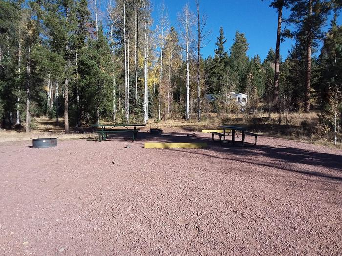 Site 3 & 4 with picnic tables, parking, and campfire rings.