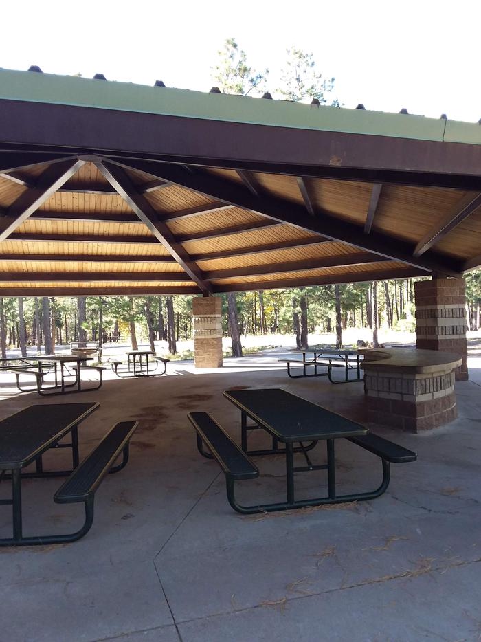 View of Crook Campground Loop B Pavilion: includes various picnic tablesCrook Campground Loop B Pavilion