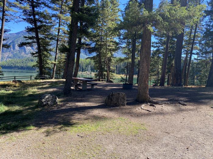 A photo of Site 002 of Loop B - LARC at HOLLAND LAKE CAMPGROUND with Picnic Table, Fire Pit, Waterfront