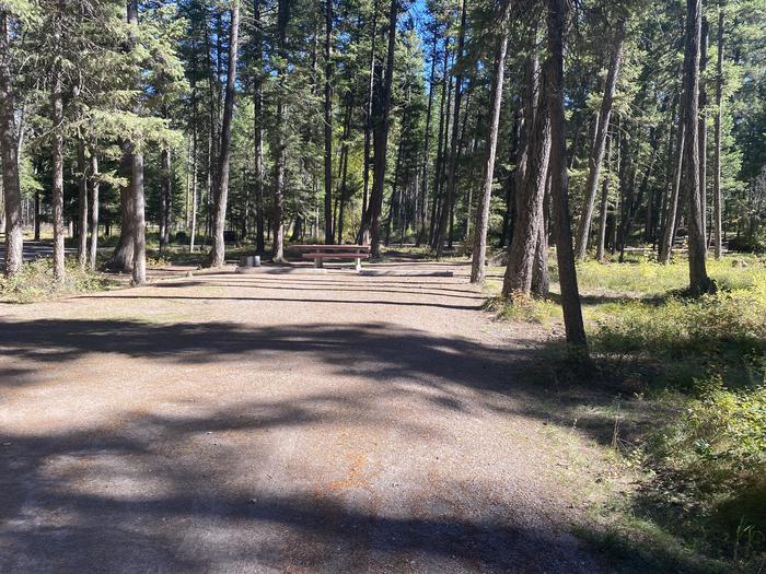 A photo of Site 026 of Loop C - BAY at HOLLAND LAKE CAMPGROUND with Picnic Table, Fire Pit
