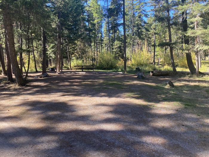 A photo of Site 022 of Loop C - BAY at HOLLAND LAKE CAMPGROUND with Picnic Table, Fire Pit