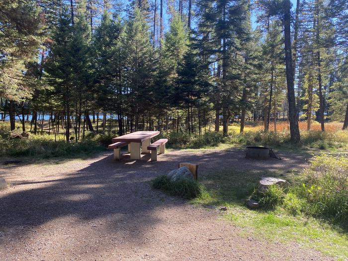 A photo of Site 032 of Loop C - BAY at HOLLAND LAKE CAMPGROUND with Picnic Table, Fire Pit