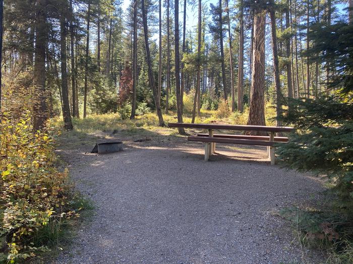 A photo of Site 038 of Loop C - BAY at HOLLAND LAKE CAMPGROUND with Picnic Table, Fire Pit