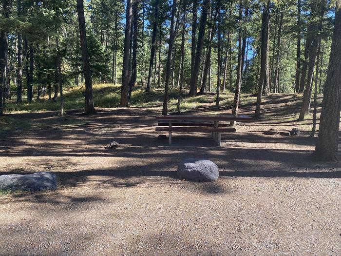 A photo of Site 023 of Loop C - BAY at HOLLAND LAKE CAMPGROUND with Picnic Table, Fire Pit, Waterfront