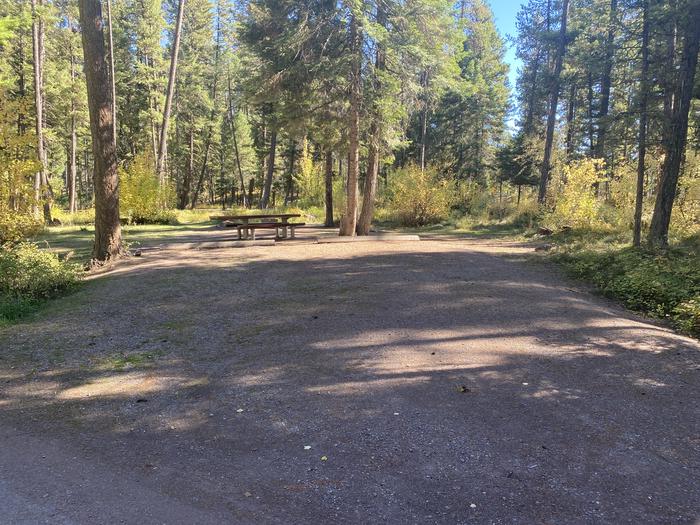 A photo of Site 027 of Loop C - BAY at HOLLAND LAKE CAMPGROUND with Picnic Table, Fire Pit