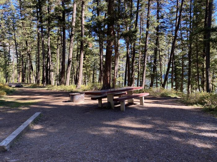 A photo of Site 015 of Loop B - LARC at HOLLAND LAKE CAMPGROUND with Picnic Table, Fire Pit, Tent Pad, Waterfront