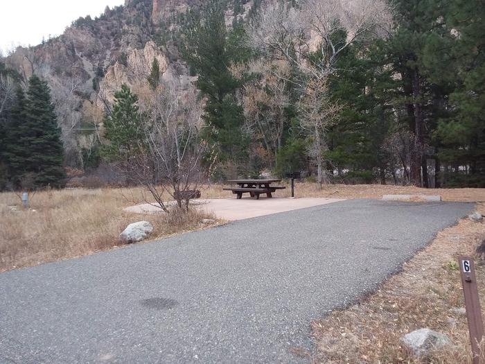 Site 6 with a picnic table, a campfire ring, parking, and camp grill.