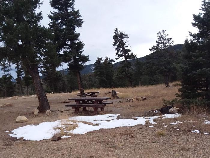 Loop A Campsite 6 with picnic table, fire pit, and mountainous views