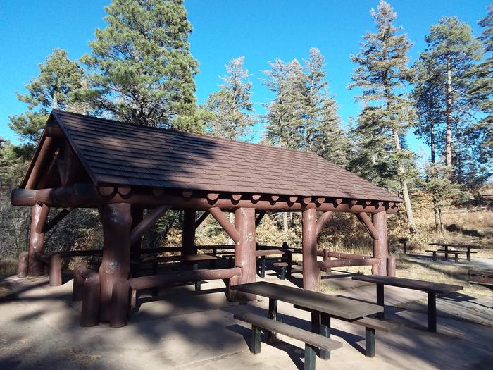 Balsam Glade Pavilion with a grill and multiple picnic tables
