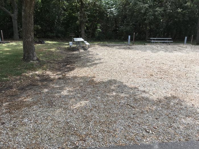 A photo of Buddy Site A036 of Loop A Loop at FARNUM CREEK with Picnic Table, Electricity Hookup, Fire Pit, Shade, Water Hookup. Site 36 is on the left.