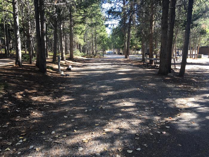 A photo of Site 404 of Loop A at Colter Bay RV Park with Full Hookup