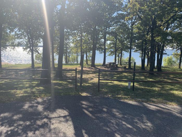 A photo of Site B19 of Loop B at BURNS RUN WEST with Picnic Table, Fire Pit, Shade, Waterfront