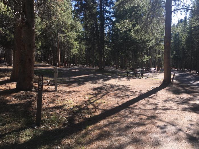 A photo of Site 65 of Loop H at Colter Bay RV Park with Full Hookup