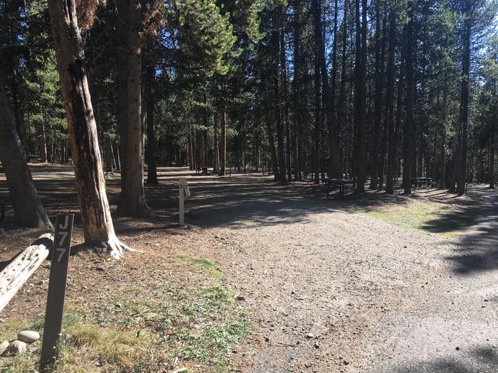 A photo of Site 477 of Loop J at Colter Bay RV Park with Full Hookup